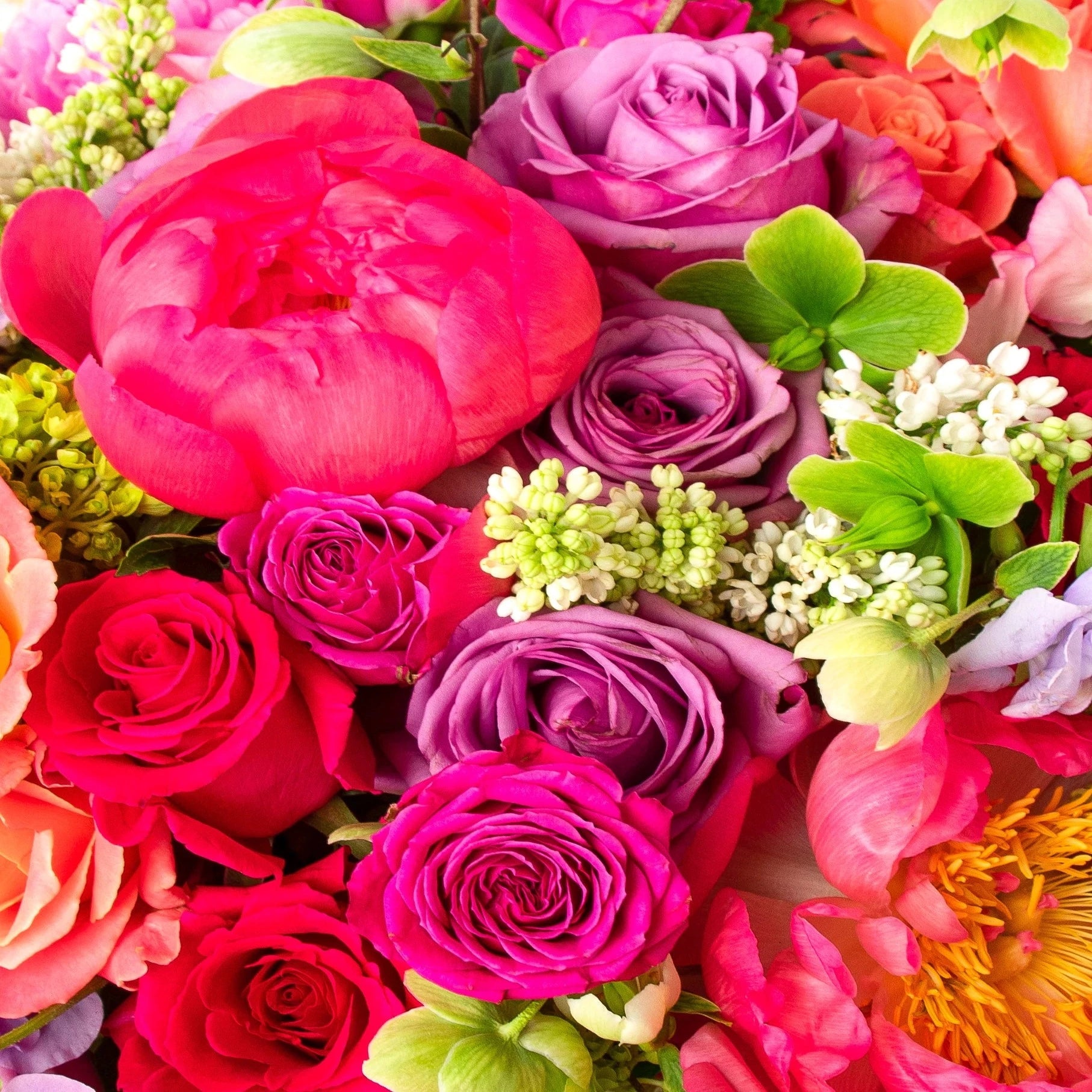 Allow our florists to select the finest and freshest spring flowers for your arrangement, which includes peonies. Colors and flowers will vary depending on what's available at the market.  NOTE: Blooms are delivered in a vase.